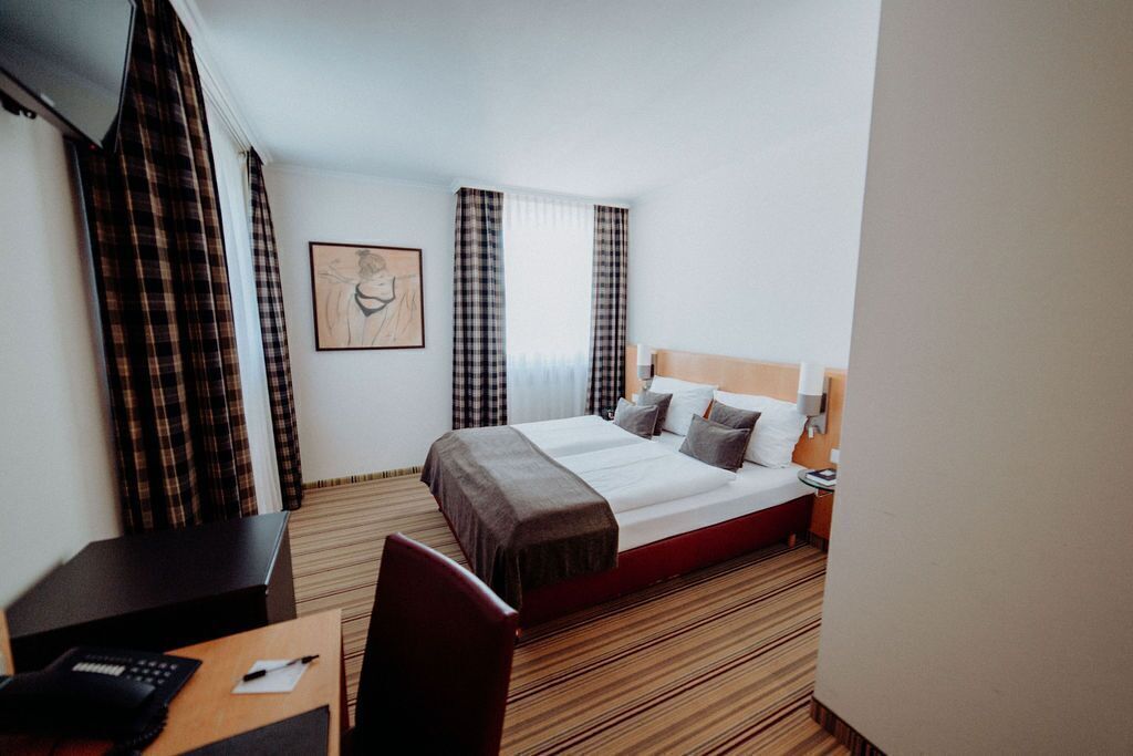 Premium bedding, in-room safe, desk, soundproofing