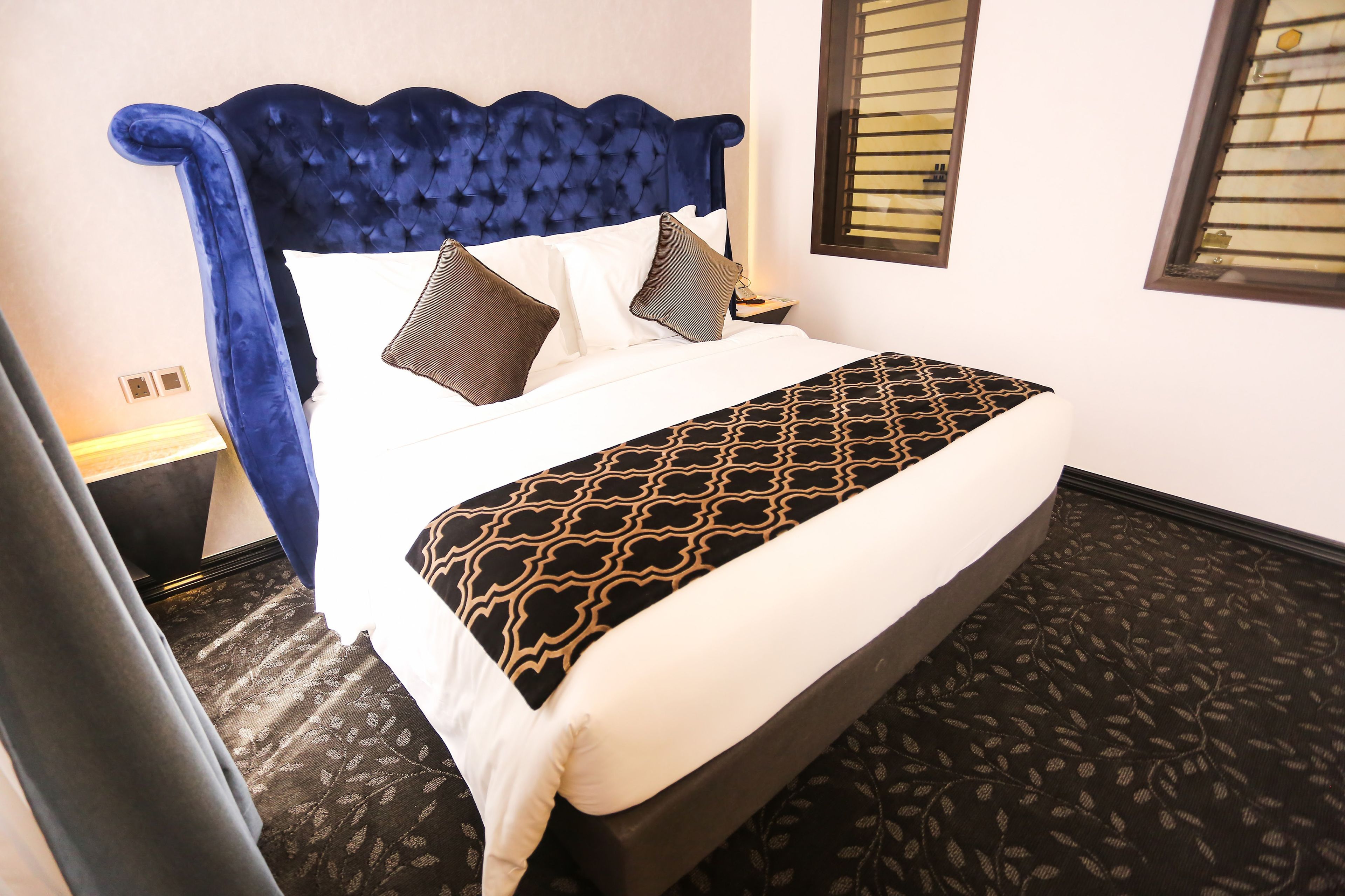 suite | in-room safe, desk, iron/ironing board, rollaway beds