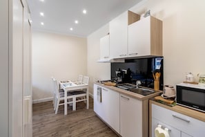 Apartment | Private kitchenette | Fridge, electric kettle, paper towels, dining tables - Stay Split Bay (Kastela)
