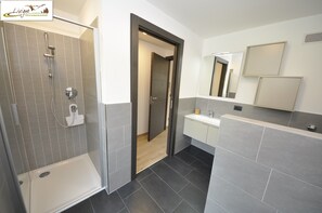 Deluxe Apartment, 1 Bedroom, Non Smoking, Mountain View | Bathroom | Shower, hair dryer, bidet, towels - Eco House Livigno (Livigno)