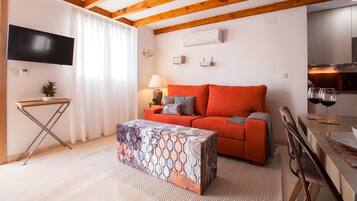 Casa de Mariana 6. Dúplex. COME TO SEVILLA | Zona de estar | Televisión de pantalla plana de 21 pulgadas con canales digitales