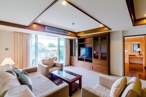 Family Suite 3 Bedrooms with Garden View | Living area | LED TV, DVD player