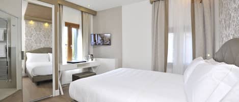 Comfort Double or Twin Room | Down comforters, minibar, in-room safe, desk