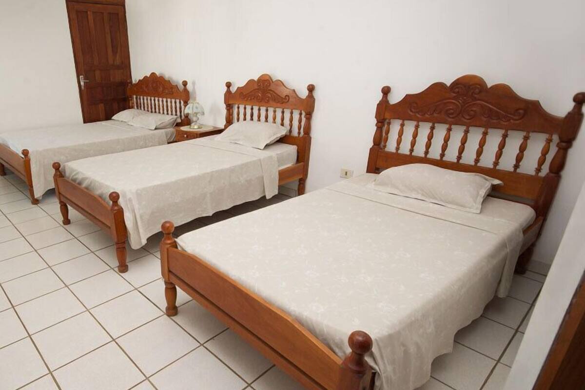 Standard Triple Room | Premium bedding, minibar, desk, iron/ironing board