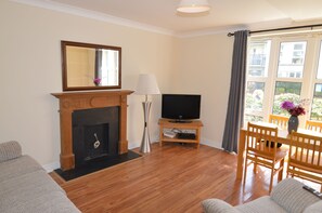 Premium Apartment, 2 Bedrooms | Living area | Flat-screen TV