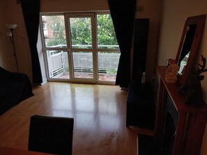 Superior Apartment, 2 Bedrooms, Garden View | Living area | Flat-screen TV