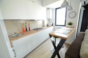 Studio 58 with balcony | Private kitchenette - Uptown Residence Apartments (Bucharest)