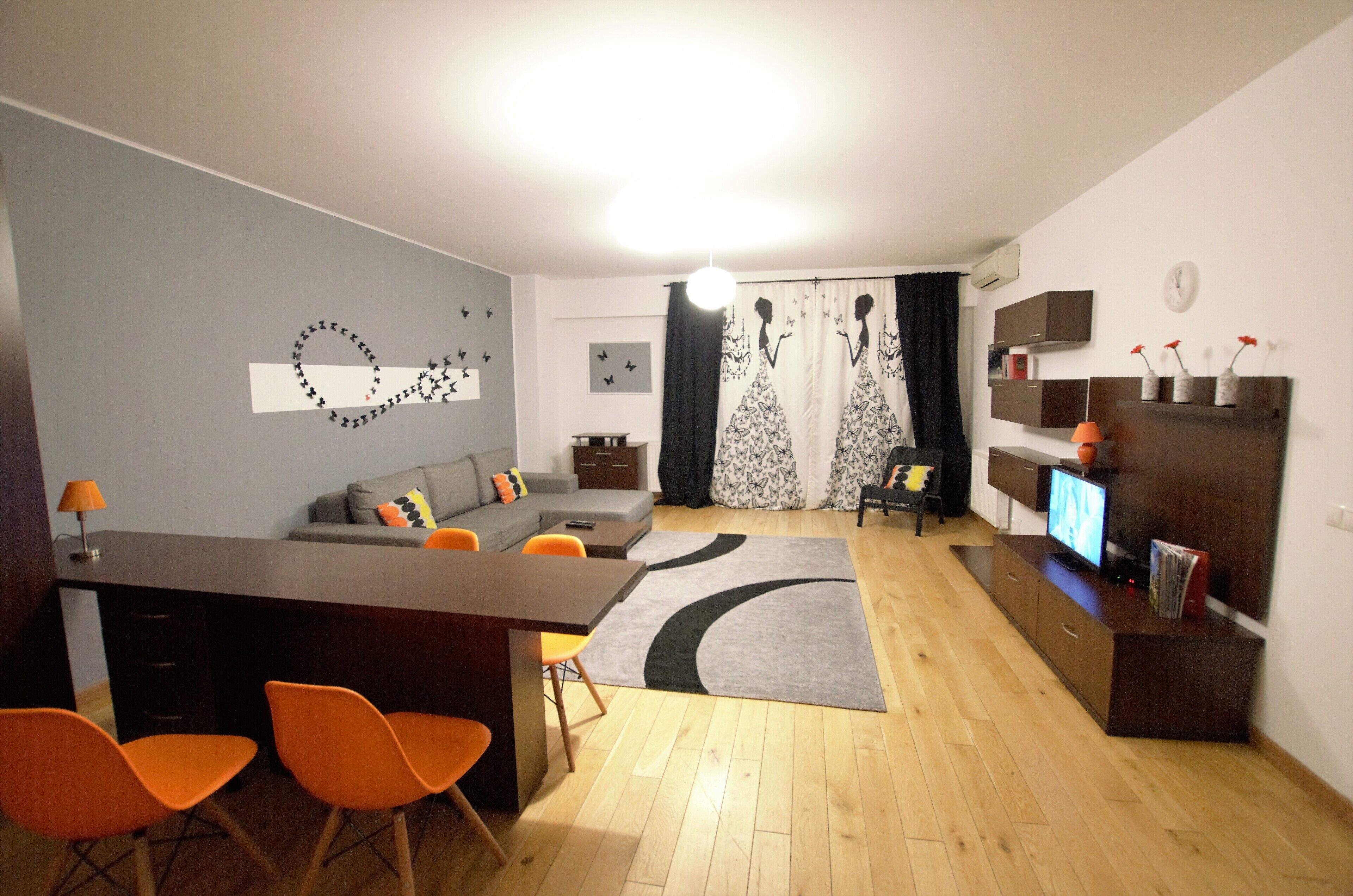 basic apartment, 1 bedroom, city view | living area | led tv