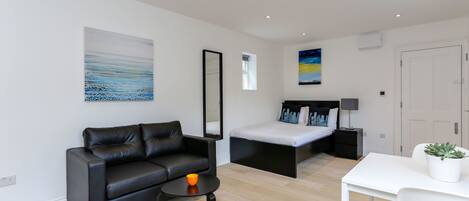 Hypo-allergenic bedding, blackout drapes, iron/ironing board, free WiFi