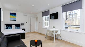 Estudi | Sala d'estar | Televisor de pantalla plana i terres tèrmics