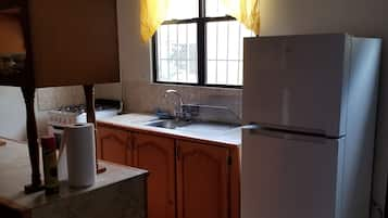 Apartment, 1 Bedroom | Private kitchen | Full-sized fridge, microwave, stovetop, coffee/tea maker