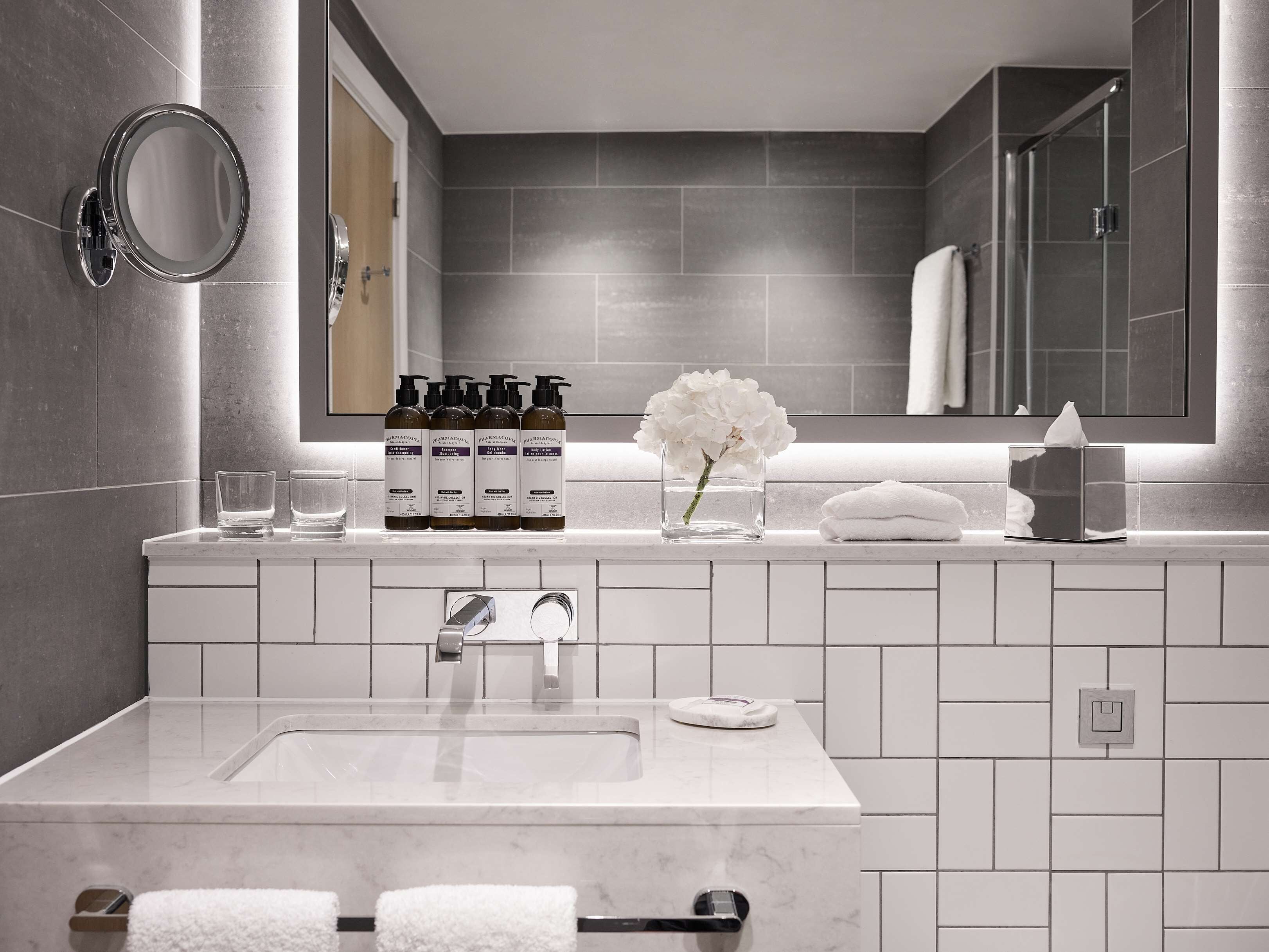 eco-friendly toiletries, hair dryer, bathrobes, slippers