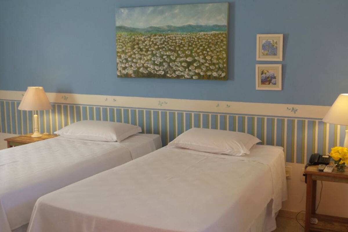 Twin Room | Minibar, iron/ironing board, free WiFi
