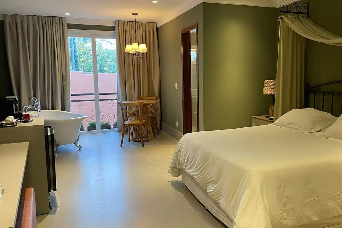 Elite Room, 1 Bedroom, Courtyard View | 1 bedroom, premium bedding, pillow-top beds, minibar