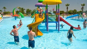 A water park with multiple slides and water play structures. - Large private villa, saltwater pool, great holiday in the Algarve (Carvoeiro)