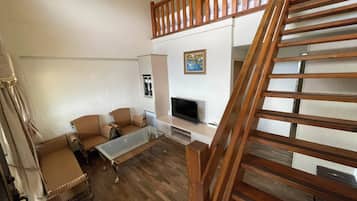 Family Room, Mezzanine | Desk, blackout drapes, soundproofing, free WiFi