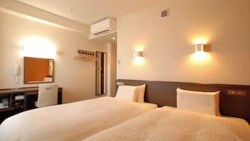Down comforters, desk, blackout drapes, soundproofing