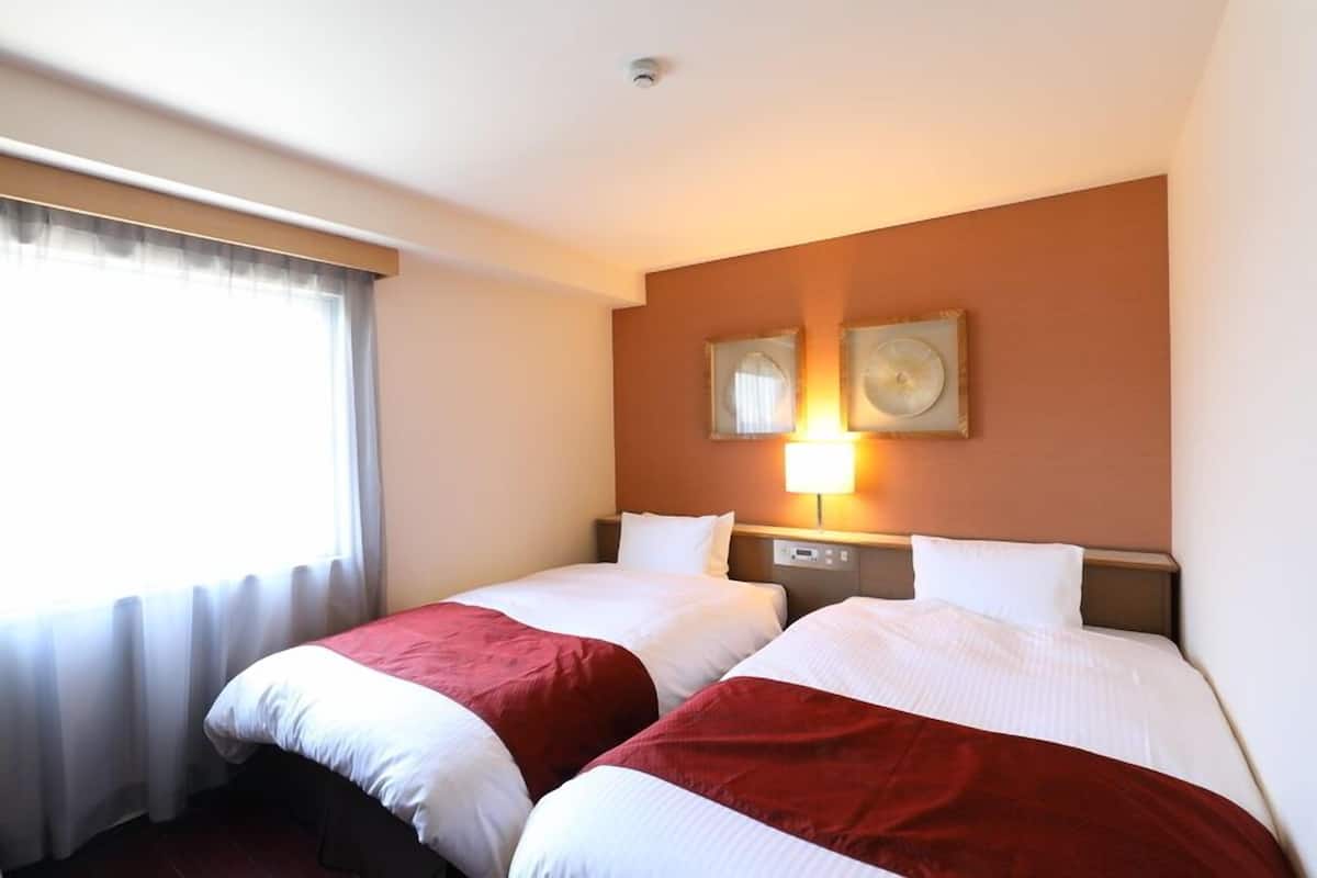 Desk, blackout curtains, free WiFi, bed sheets