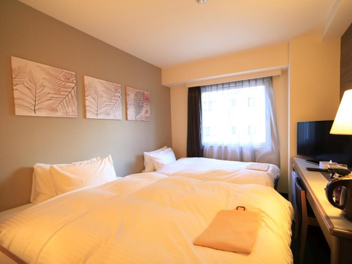 desk, blackout curtains, free wifi, bed sheets