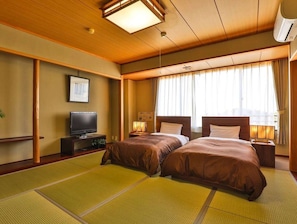 Japanese Style Twin Room, Shared Bathroom, Private Toilet | Down comforters, free WiFi, bed sheets, wheelchair access
