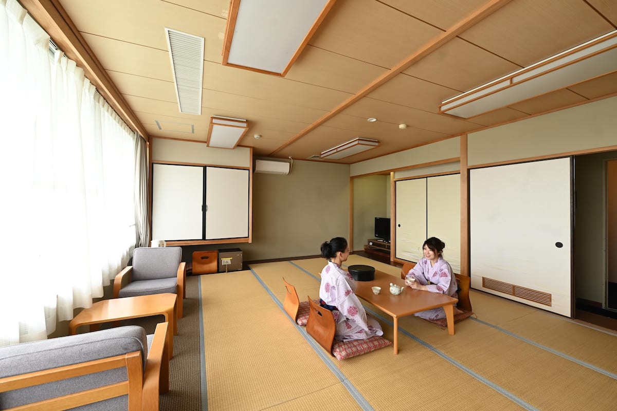 傳統四人房 | 羽絨被、免費 Wi-Fi、床單