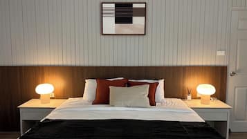 Two-Bedroom Luxury Suite | Living area | 50-inch TV with digital channels