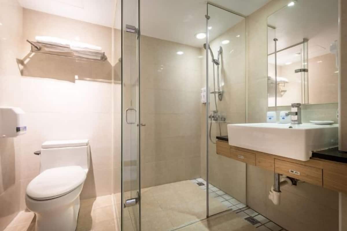 Bathroom | Shower, hair dryer, slippers, towels