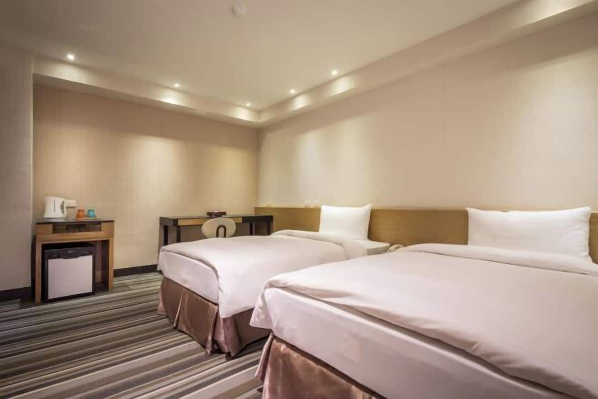 Down comforters, desk, blackout drapes, soundproofing