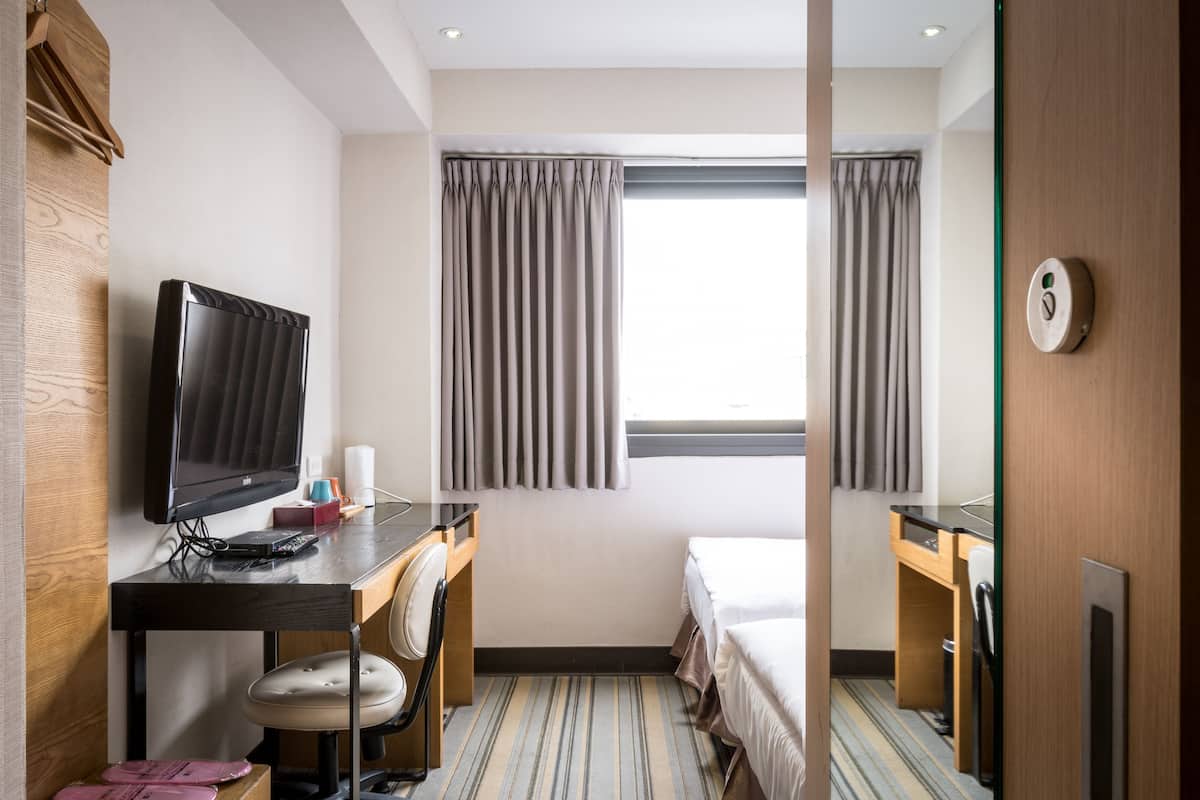 Down comforters, desk, blackout drapes, soundproofing