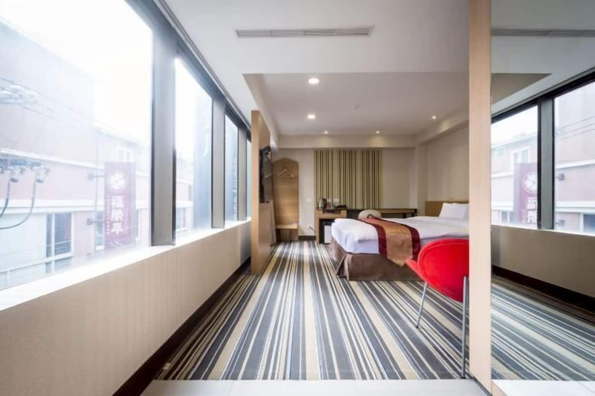 Down comforters, desk, blackout drapes, soundproofing