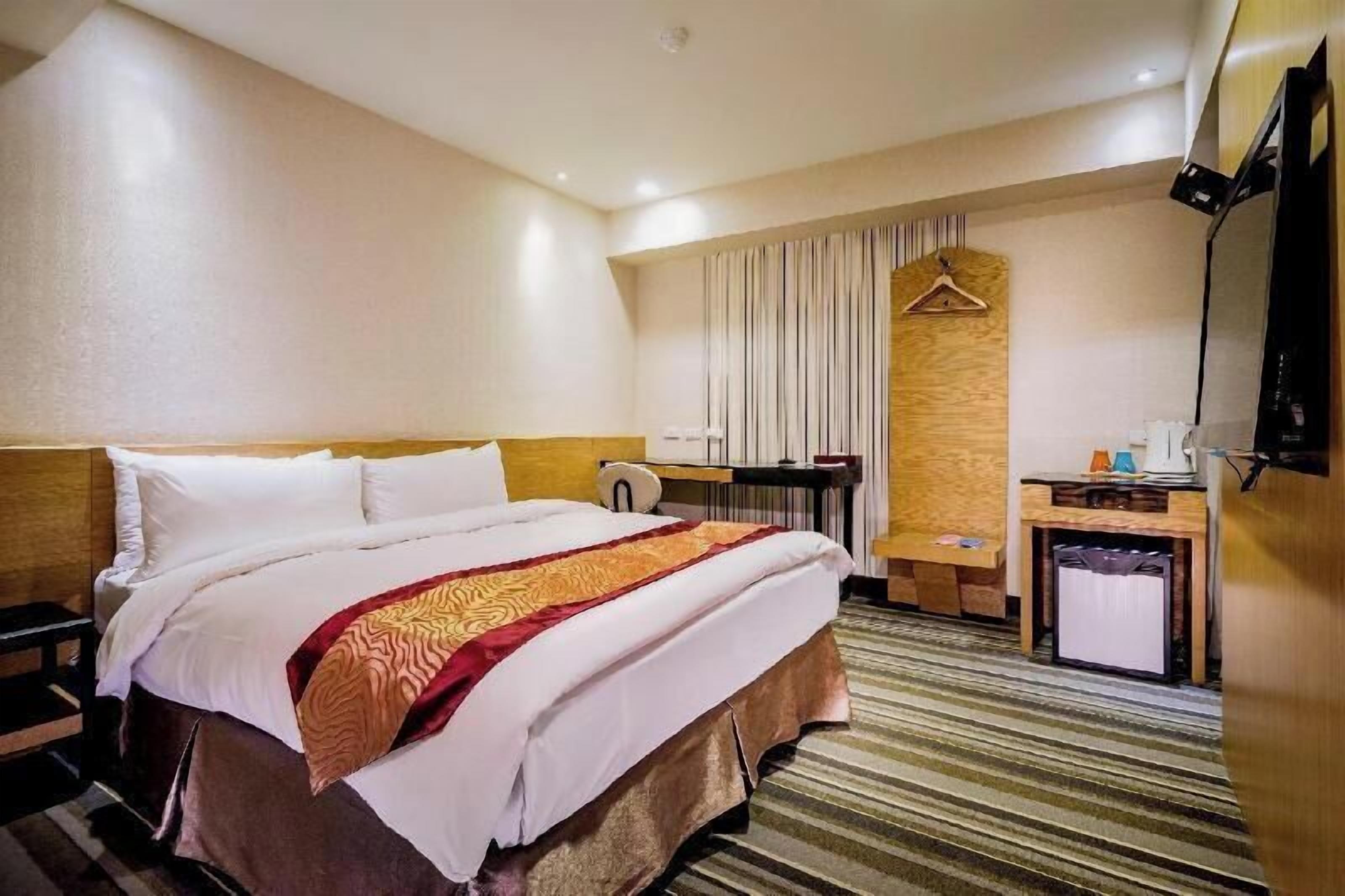 Down comforters, desk, blackout drapes, soundproofing