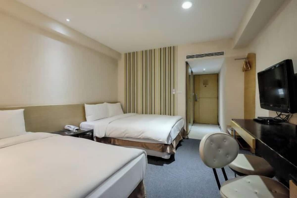 Down comforters, desk, blackout drapes, soundproofing