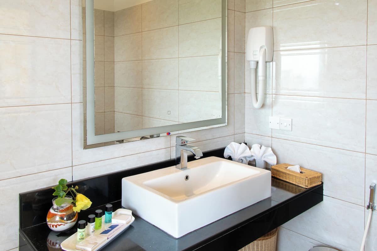 suite room with panoramic seaview | bathroom | shower, free toiletries, hair dryer, bathrobes