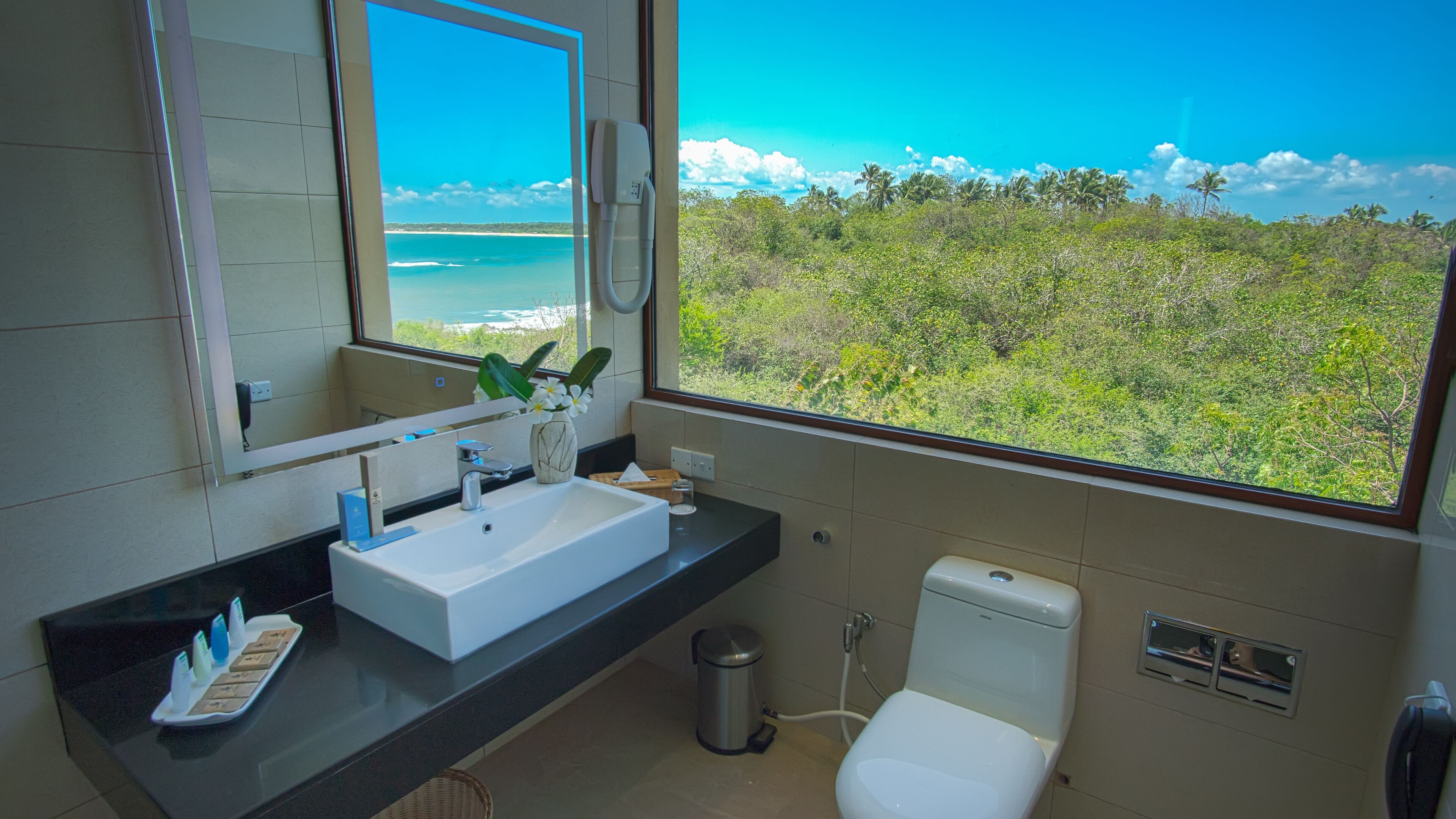 luxury room with panoramic sea view | bathroom | shower, free toiletries, hair dryer, bathrobes