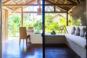 Habitación Deluxe, vista al jardín | Terraza o patio