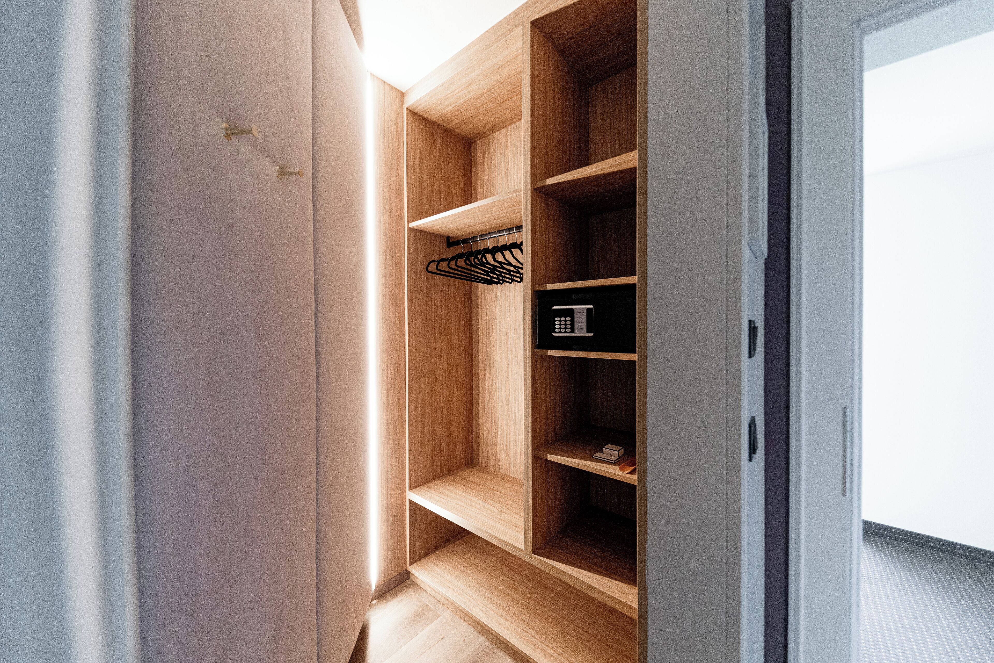 premium double room | living area | flat-screen tv