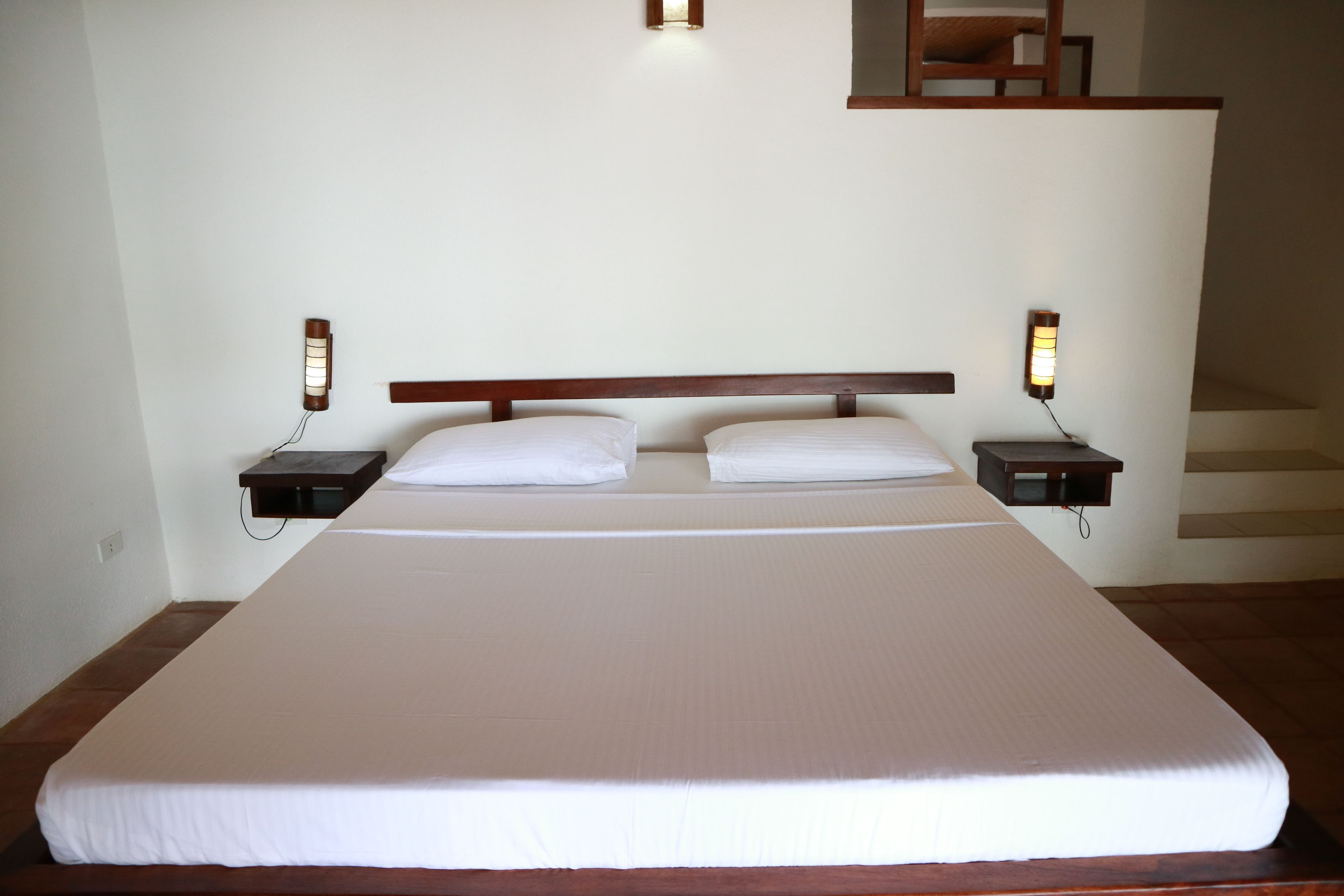 deluxe villa | in-room safe, desk, bed sheets
