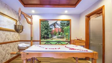 A room with a wooden bed, a wooden bench, a hanging bathrobe, a wooden bench with a towel, a wooden bench with a towel, a wooden bench with a towel, a wooden bench with a towel, a wooden bench with a towel, a wooden bench with a towel, a wooden bench with a towel, a wooden bench with a towel, a wooden bench with a towel, a wooden bench with a towel, a wooden bench with a towel, a wooden bench with a towel, a wooden bench with a towel, a wooden bench with a towel, a wooden bench with a towel, a wooden bench with a towel, a wooden bench with a towel, a wooden bench with a towel, a wooden bench with a towel, a wooden bench with a towel, a wooden bench with a towel, a wooden bench with a towel, a wooden bench with a towel, a wooden bench with a towel, a wooden bench with a towel, a wooden bench with a towel