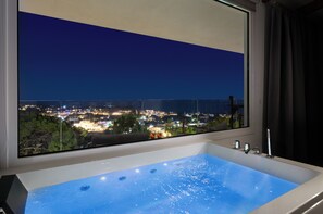 Honeymoon Studio Suite, Balcony, Sea View | Living area | Flat-screen TV