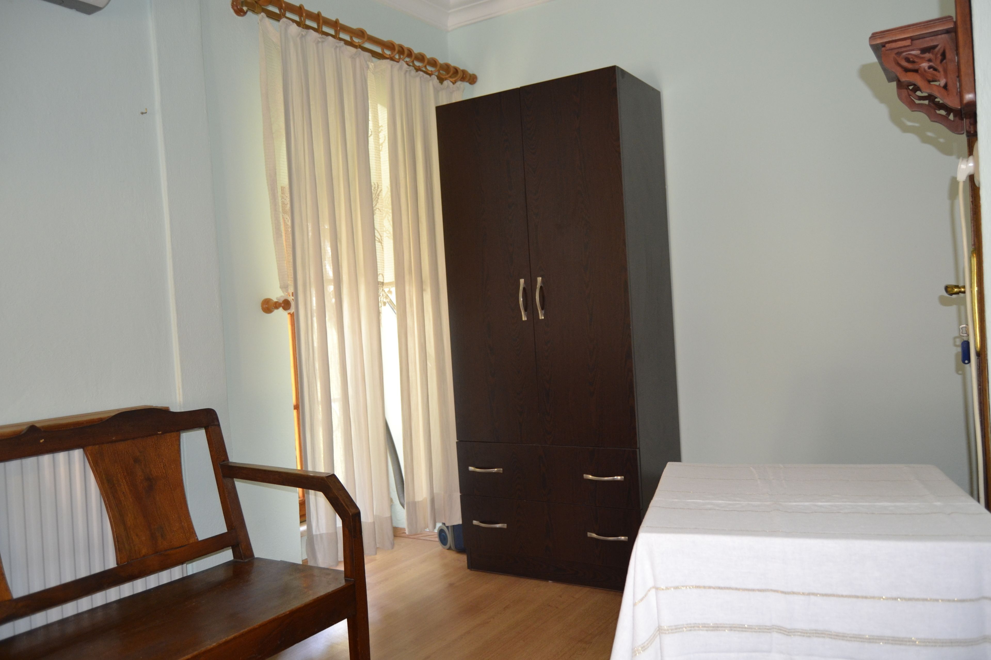 twin room, shared bathroom | desk, iron/ironing board, free wifi