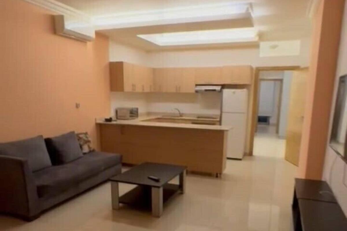 Deluxe Apartment, 2 Bedrooms | Living area | 40-inch flat-screen TV with cable channels, TV