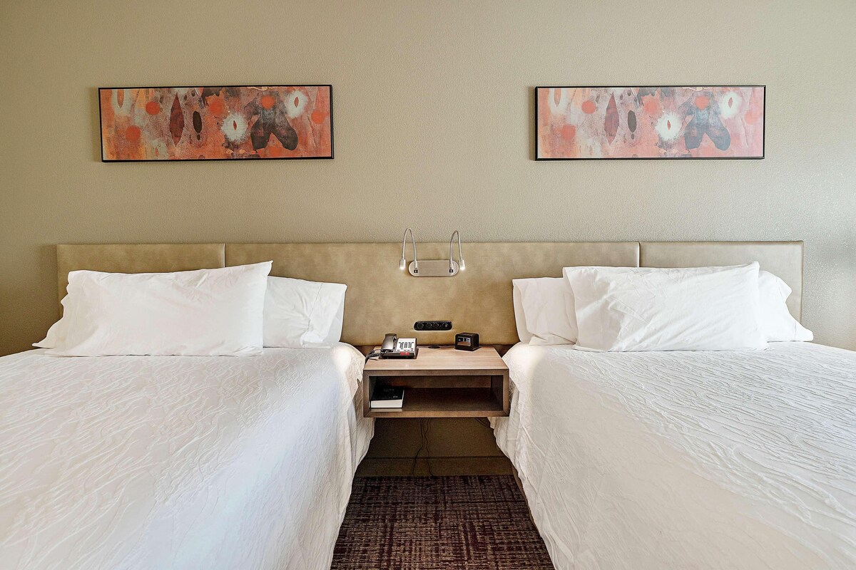 Premium bedding, down duvets, blackout curtains, free WiFi