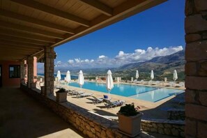 Outdoor pool, pool umbrellas, pool loungers