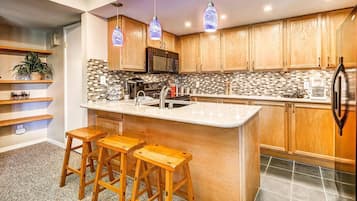 Condo, 2 Bedrooms | Private kitchen | Full-sized fridge, microwave, oven, stovetop