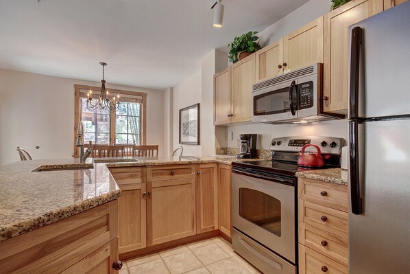 Condo, 2 Bedrooms | Private kitchen | Full-size fridge, microwave, oven, stovetop