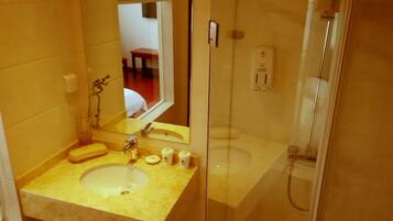 Shower, free toiletries, hair dryer, slippers