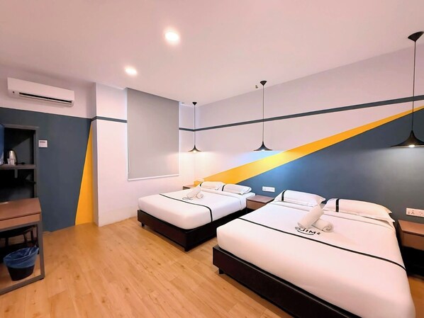 Familiekamer | Een bureau, een strijkplank/strijkijzer, gratis wifi, beddengoed