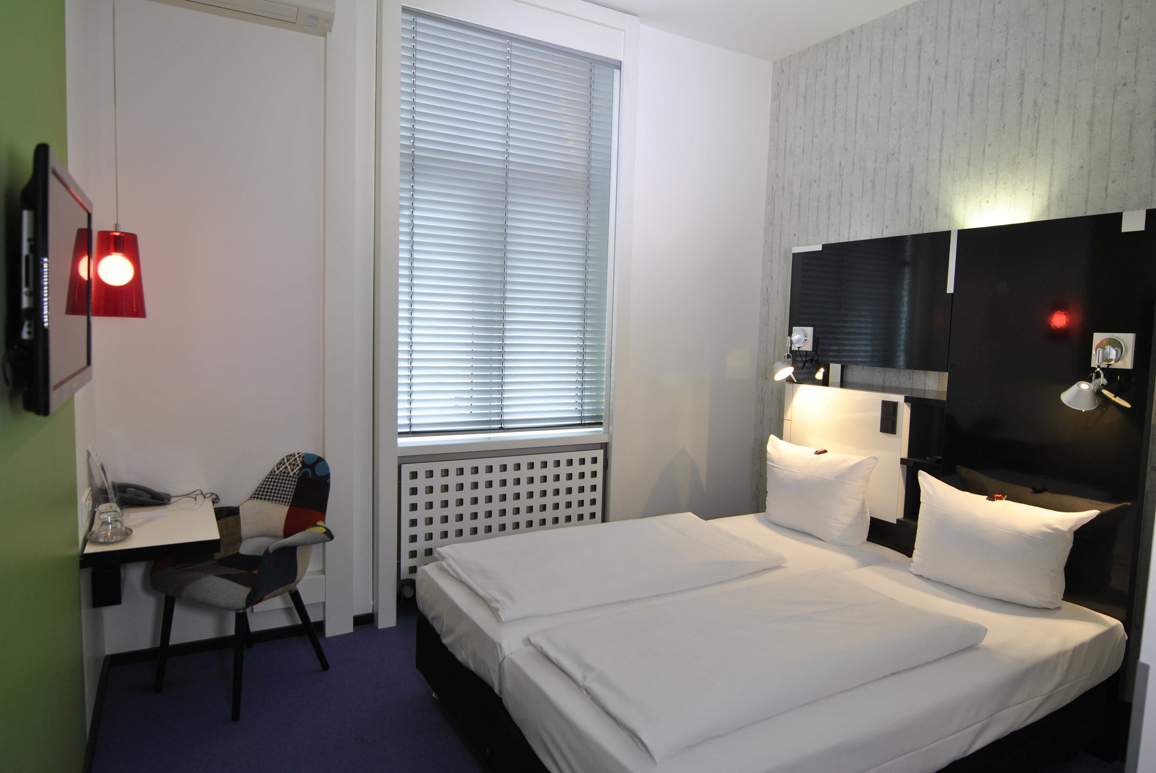 standard double room | individually furnished, desk, laptop workspace, blackout curtains