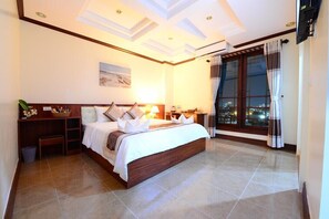 ห้องดีลักซ์ซิงเกิล | ผ้าปูที่นอนฝ้ายอียิปต์, เครื่องนอนระดับพรีเมียม, มินิบาร์