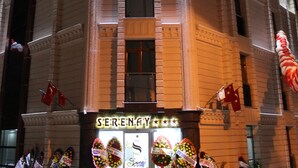 A hotel with a prominent entrance, large windows, and a sign reading "SERENAY." - Grand Serenay Hotel (Bandirma)